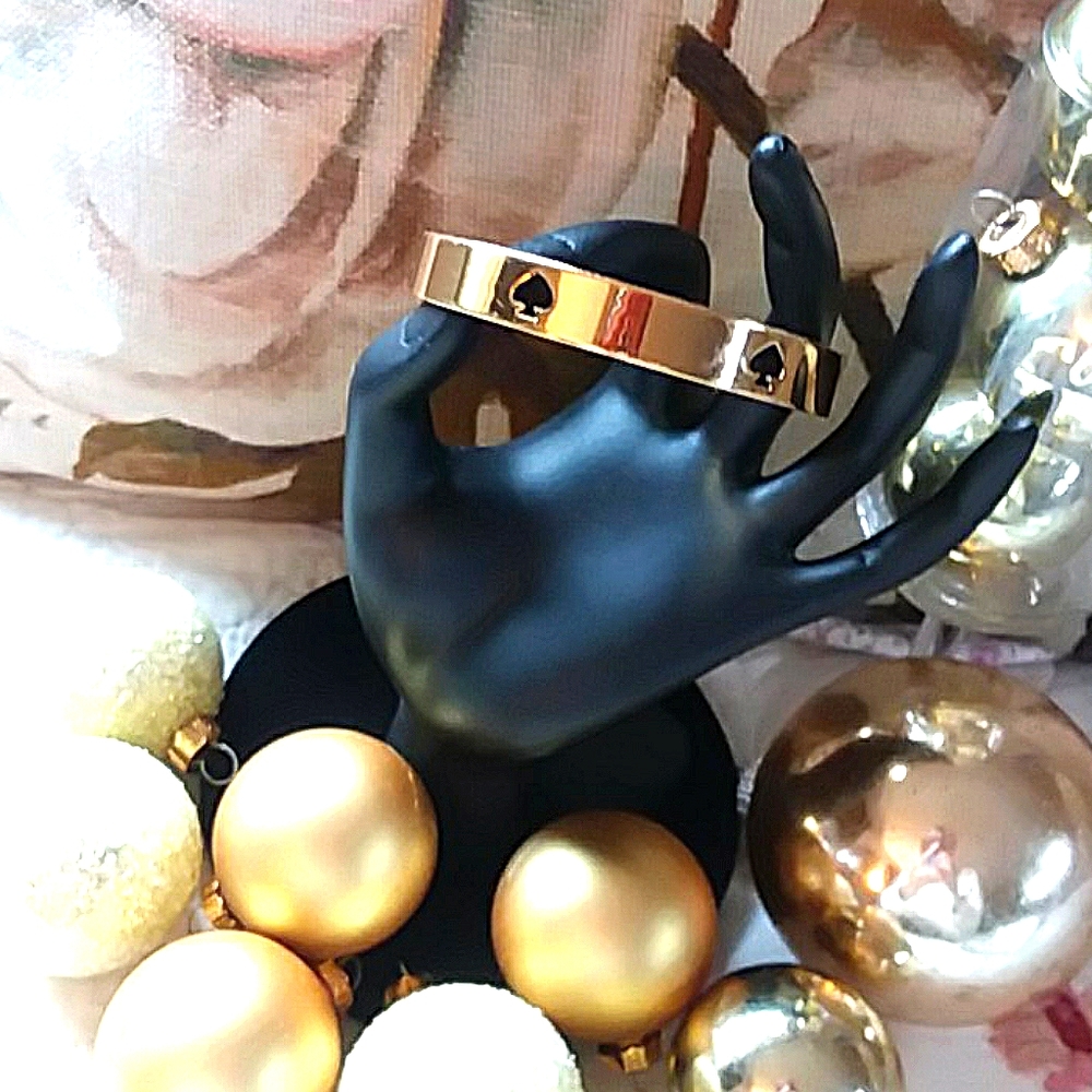 KATE SPADE gold and black bangle bracelet